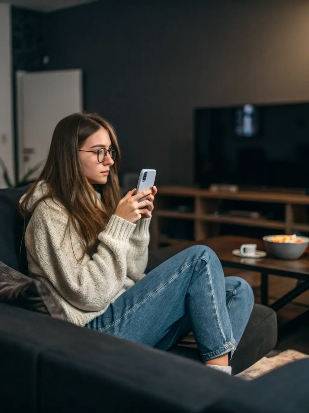 A person using a habit tracker app on a smartphone, monitoring progress and reinforcing positive behaviors, emphasizing habit formation and personal development, in the context of productivity resources offered by formaccesshub.